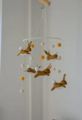 Jumping bunny mobile with felted balls